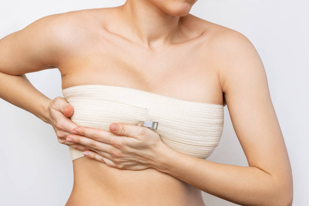 concept of signs you need breast implant revision